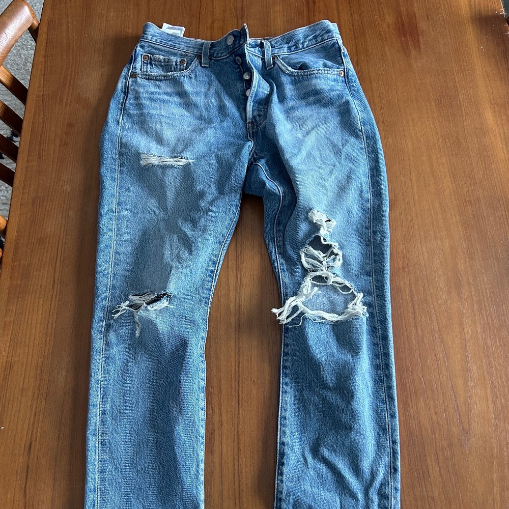 Levi 501 distressed denim jeans